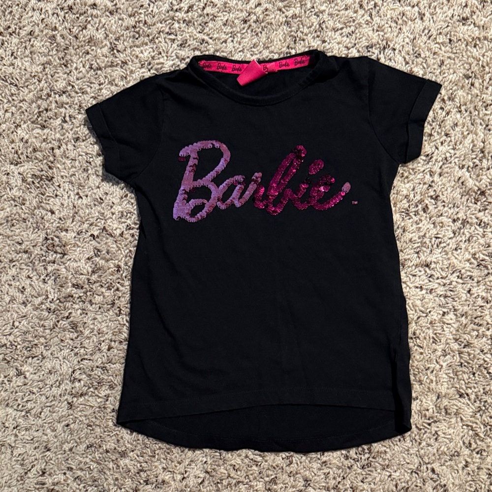 Girls size 5/6 Barbie hi low black tee with “Barbie” in flip pink sequins